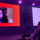 Mark Venturelli via video introduces the surprise slide about NFTs to a live audience.